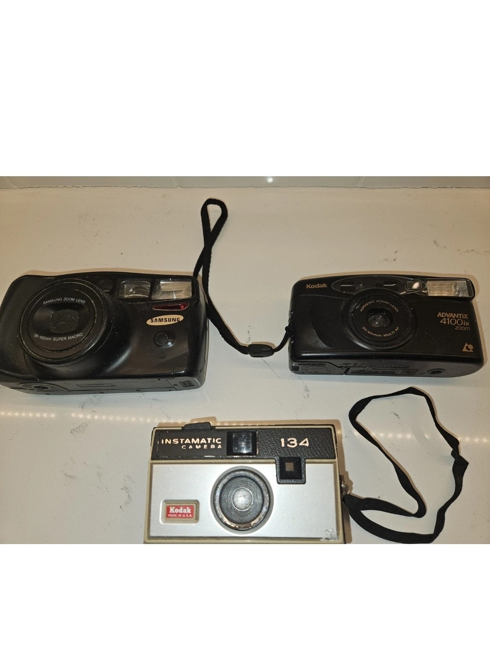 Set of 3 Vintage Cameras Kodak instamatic 134, Advantix 4100, Samsung. Untested